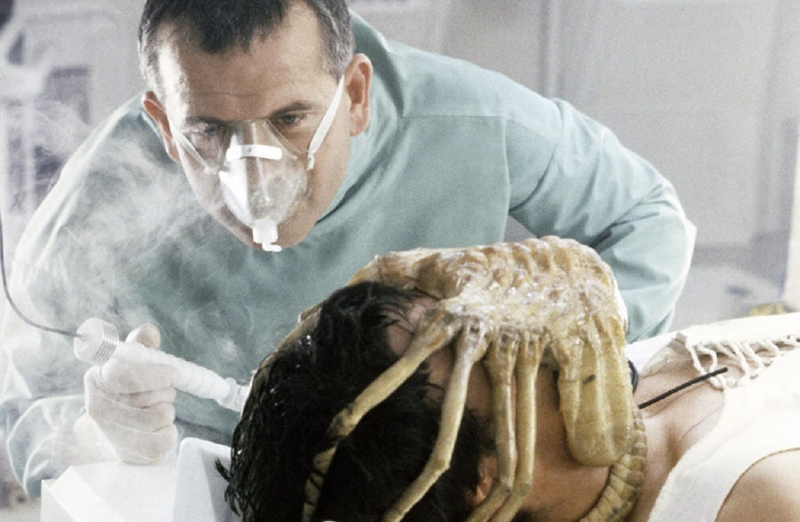 Ash looks at the Facehugger in Alien