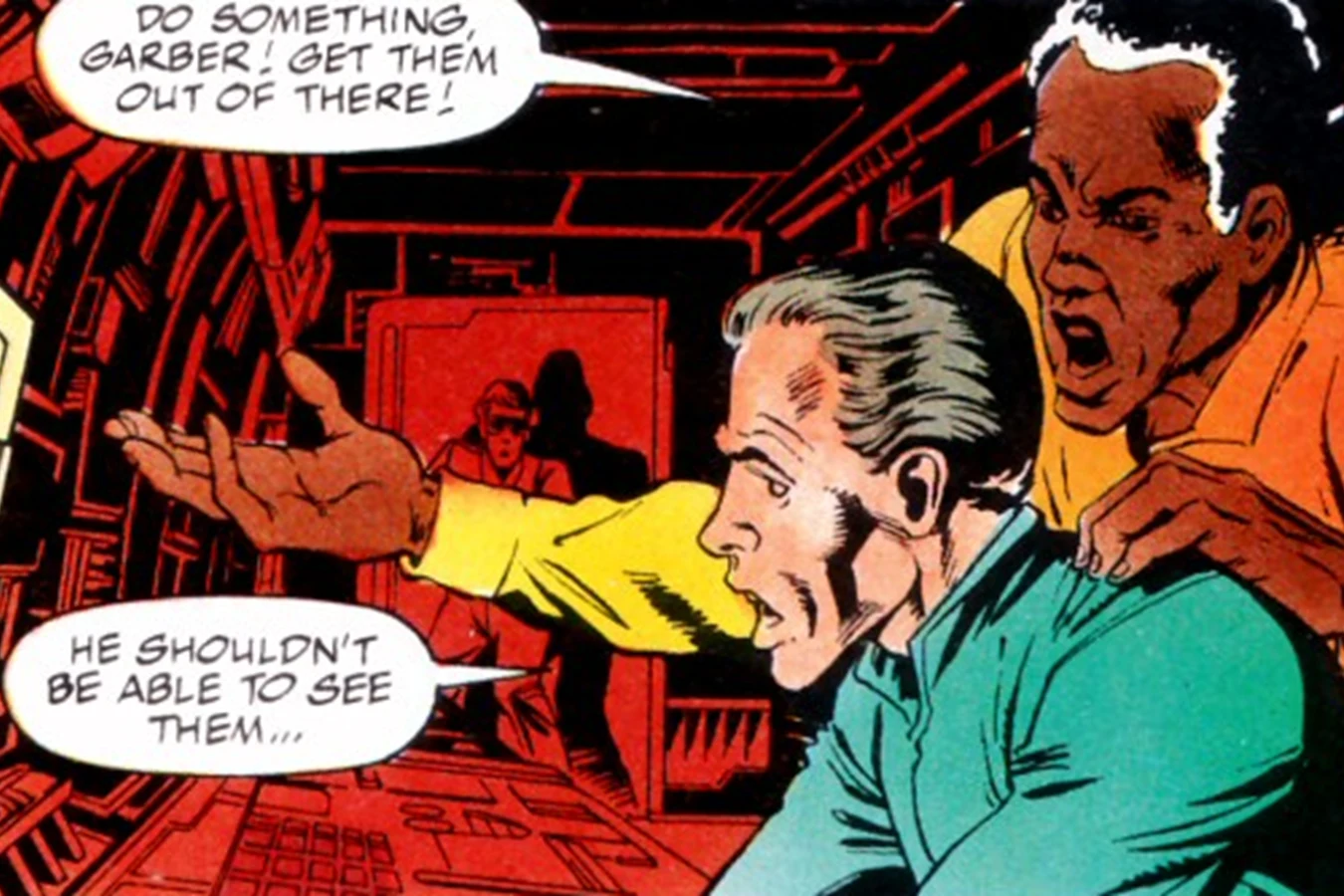 Harrigan grabbing a gray-haired Garber by the shoulder at the trailer monitors in the Dark Horse Predator 2 comic