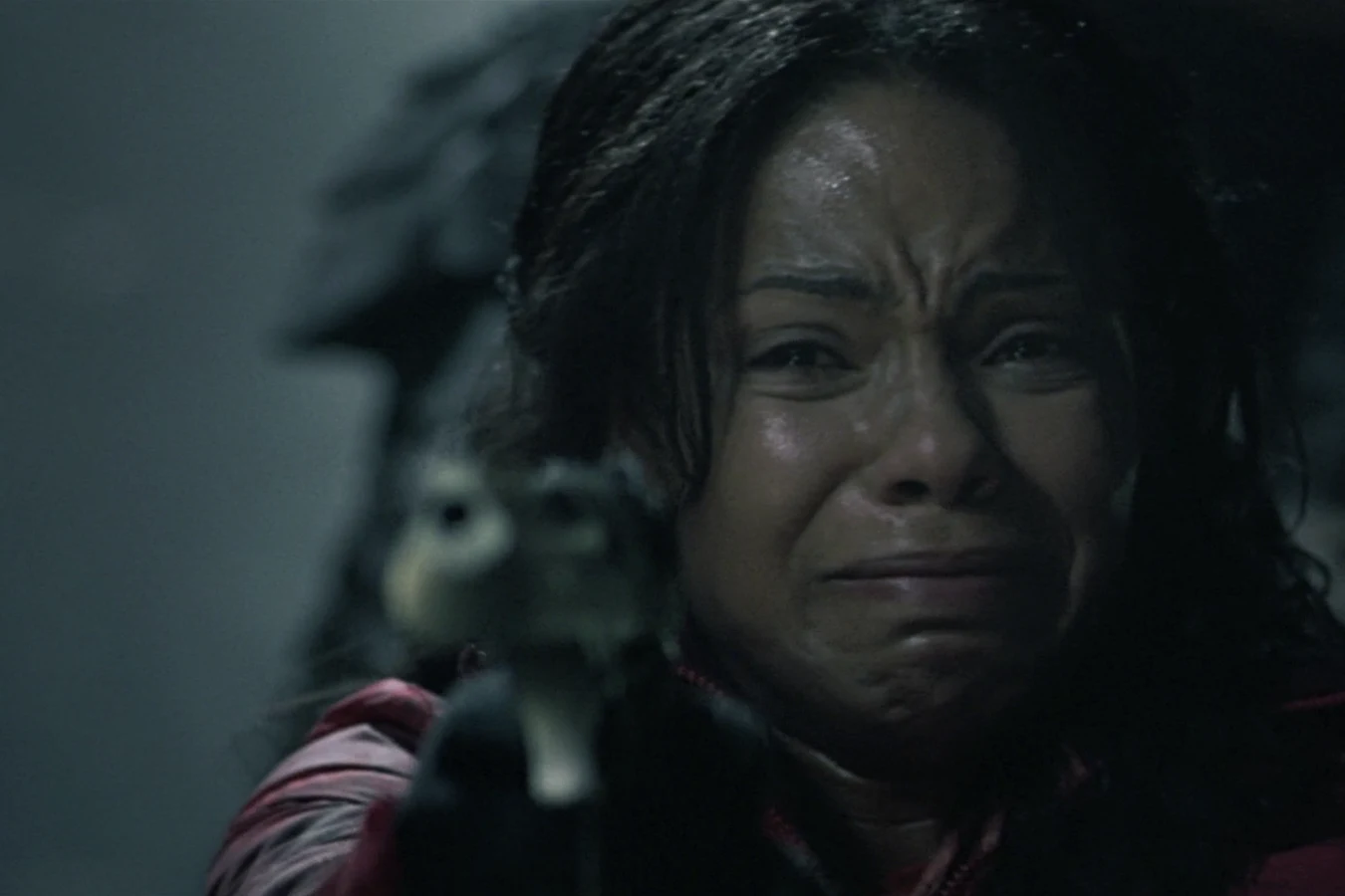 Alexa Woods aims a pistol inside the Bouvetoya pyramid
