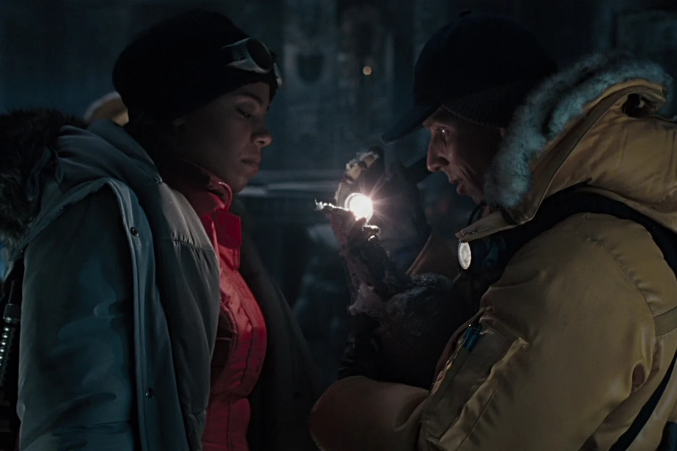 Alexa Woods and Graeme Miller examine a human spine inside the pyramid in Alien vs. Predator