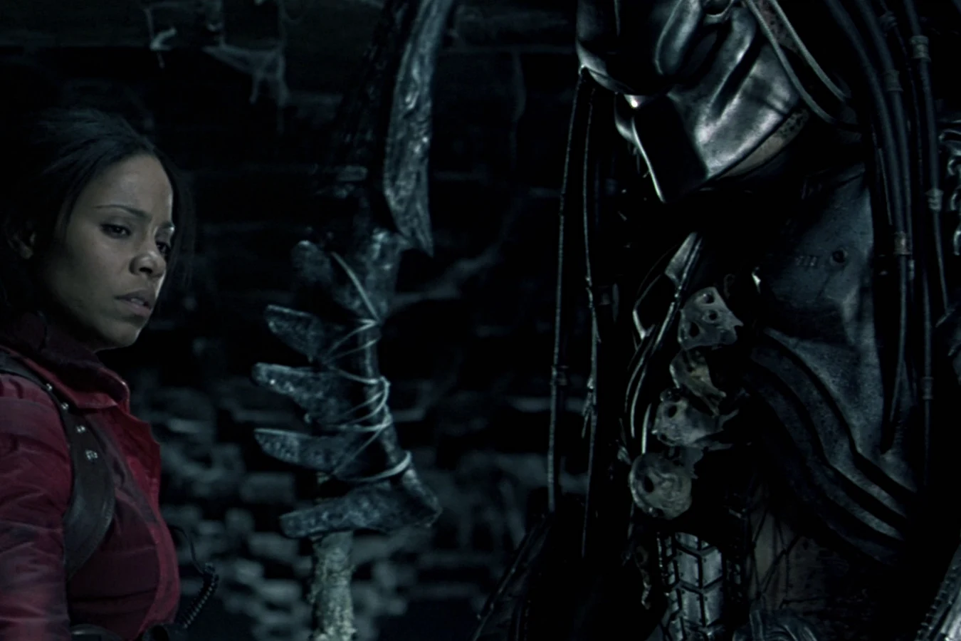 Alexa Woods stands with Scar Predator after they begin fighting together