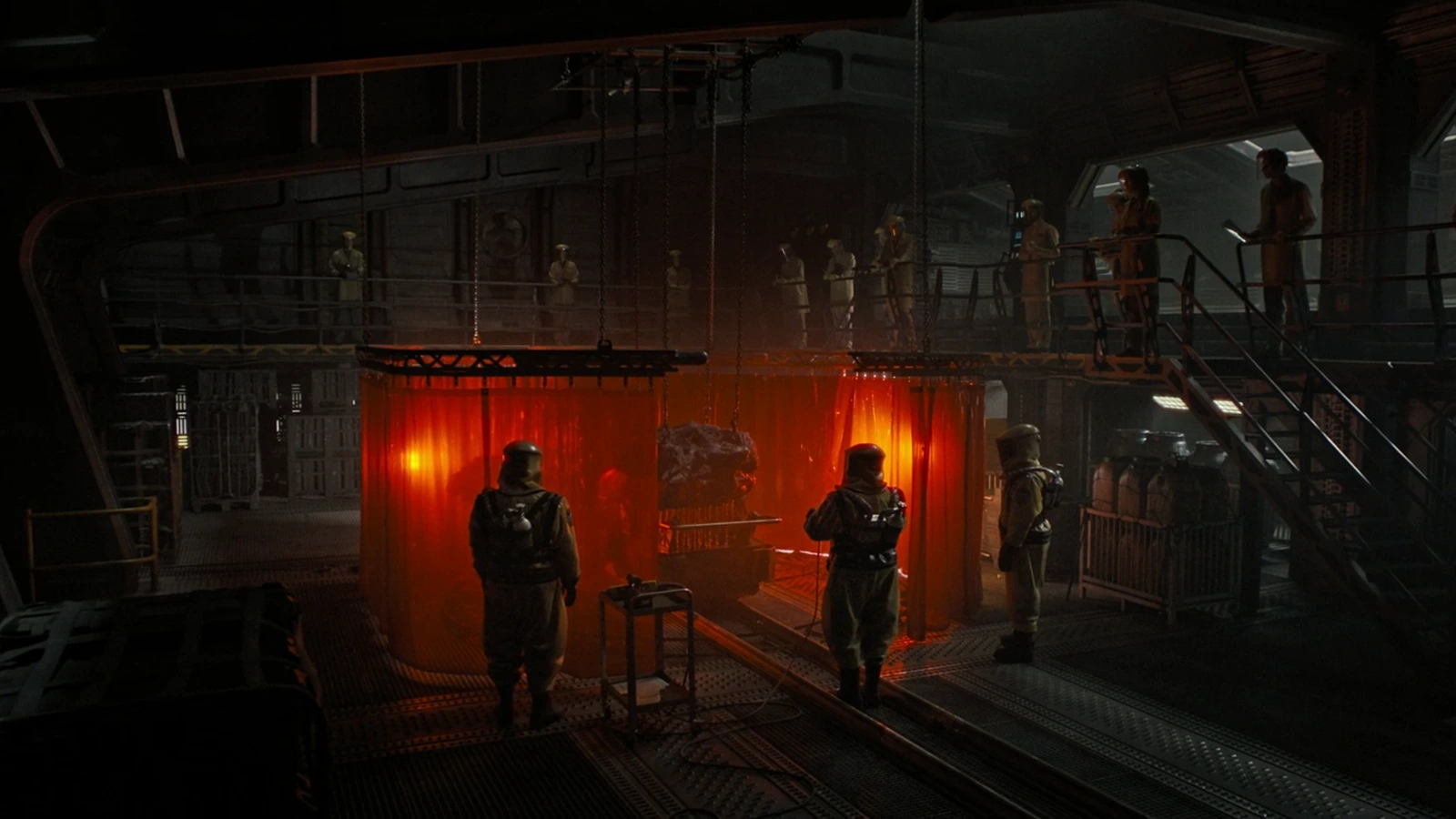 Scientists cut open the Big Chap cocoon aboard Renaissance Station in Alien: Romulus