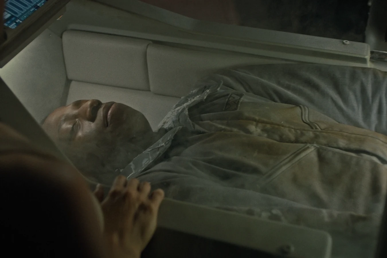 Damaged Andy lying in a cryopod on the Corbelan IV