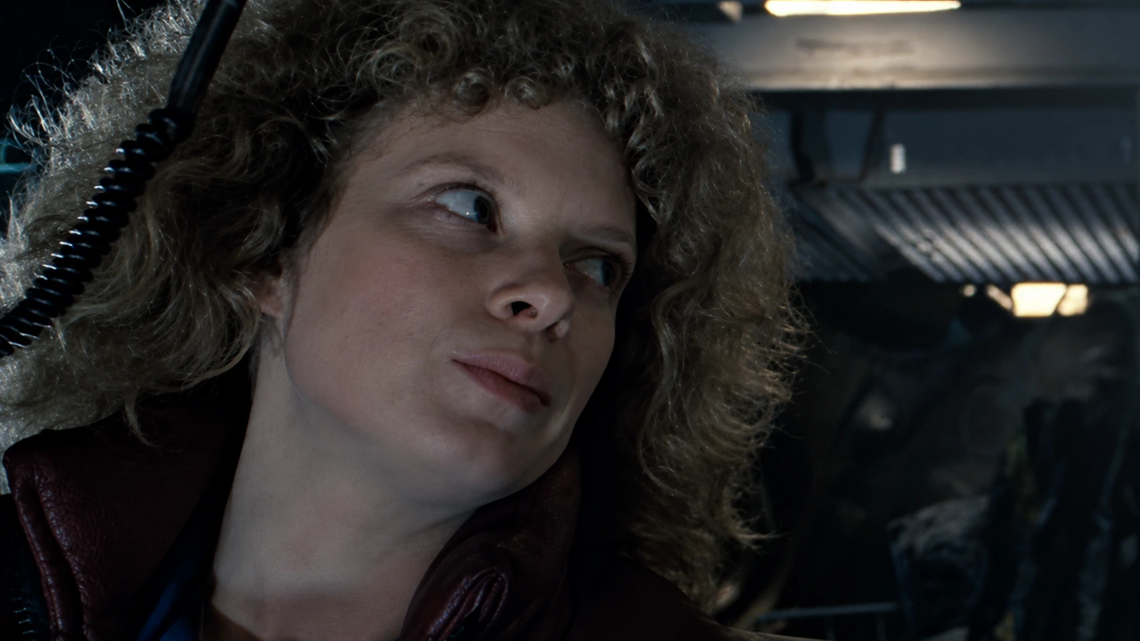 Anne Jorden with curly hair in the tractor cab in the Aliens Special Edition