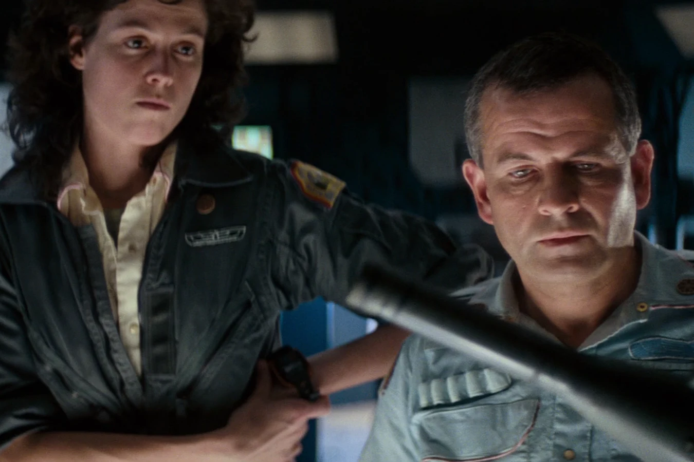 Ripley and Ash with a motion detector on the Nostromo