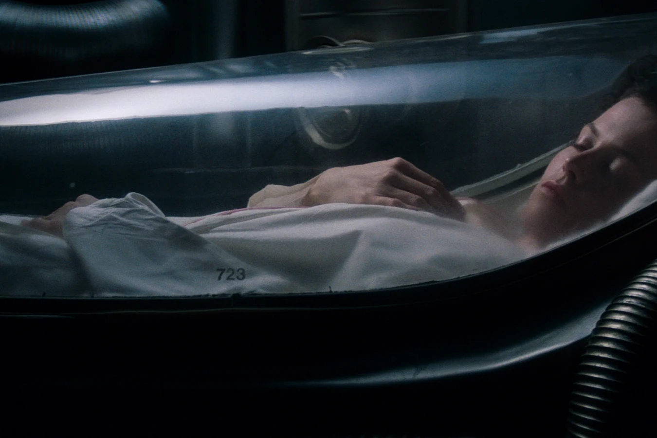 Ripley asleep in the Narcissus hypersleep tube after the Nostromo was destroyed