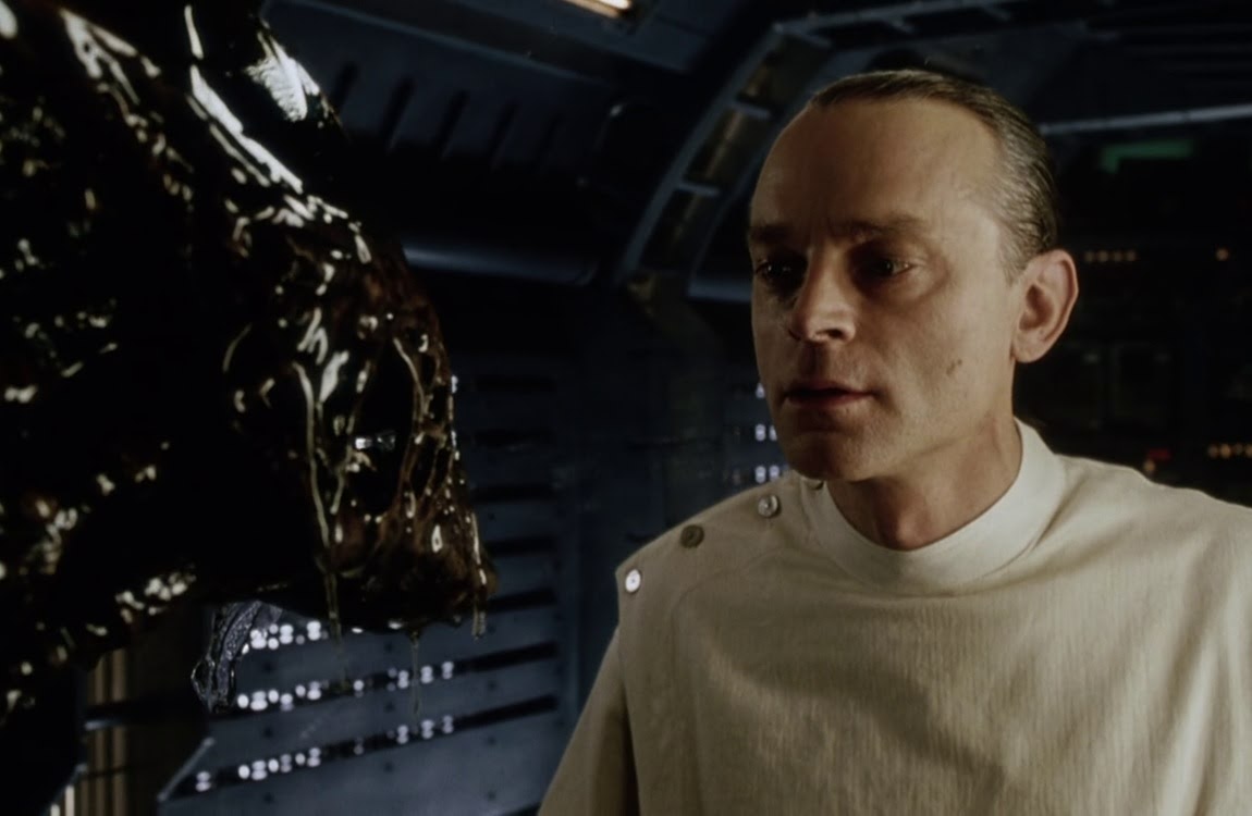 Dr. Gediman with a cloned Xenomorph
