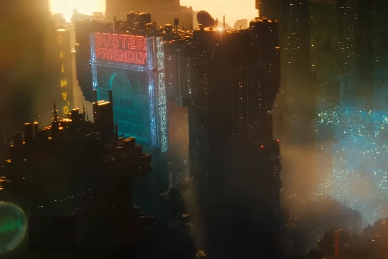 A tower billboard reading Buster Friendly, with Live From Mexico down the side, in the Blade Runner 2099 teaser