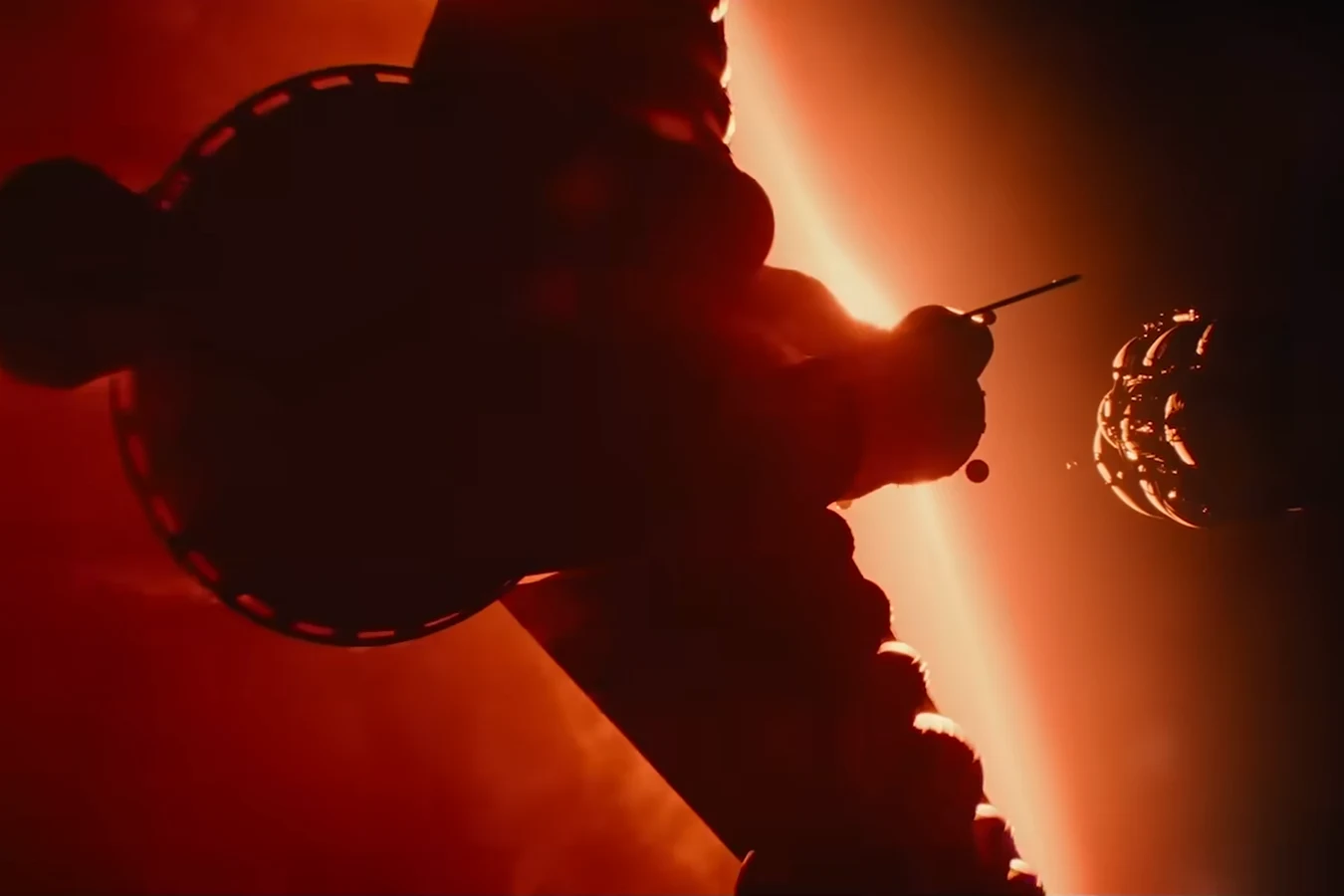 A colony ship lifting away from a planet in red light in the Blade Runner 2099 teaser