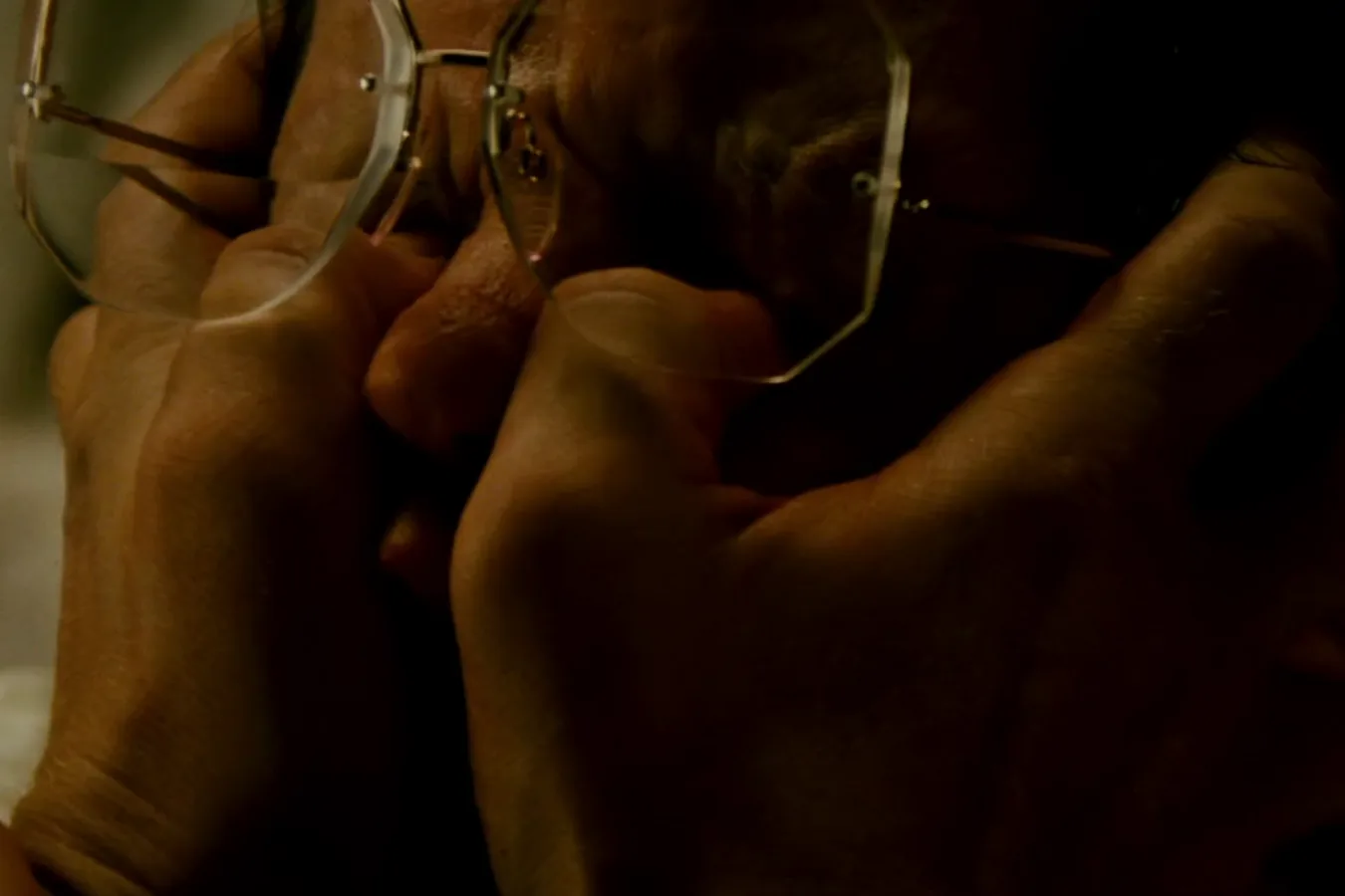 Roy Batty's hands closing over Eldon Tyrell's face and glasses as he kills him in Blade Runner