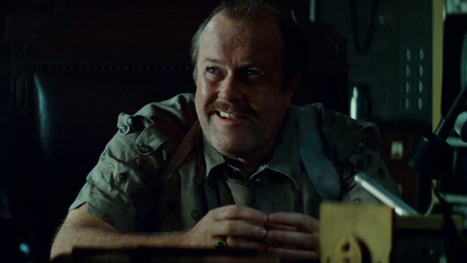 M. Emmet Walsh as Captain Harry Bryant in a suit and fedora in Blade Runner