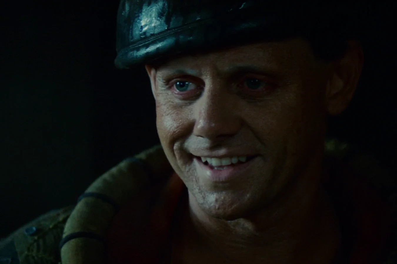 J.F. Sebastian in his cap smiling at Pris outside the Bradbury in Blade Runner
