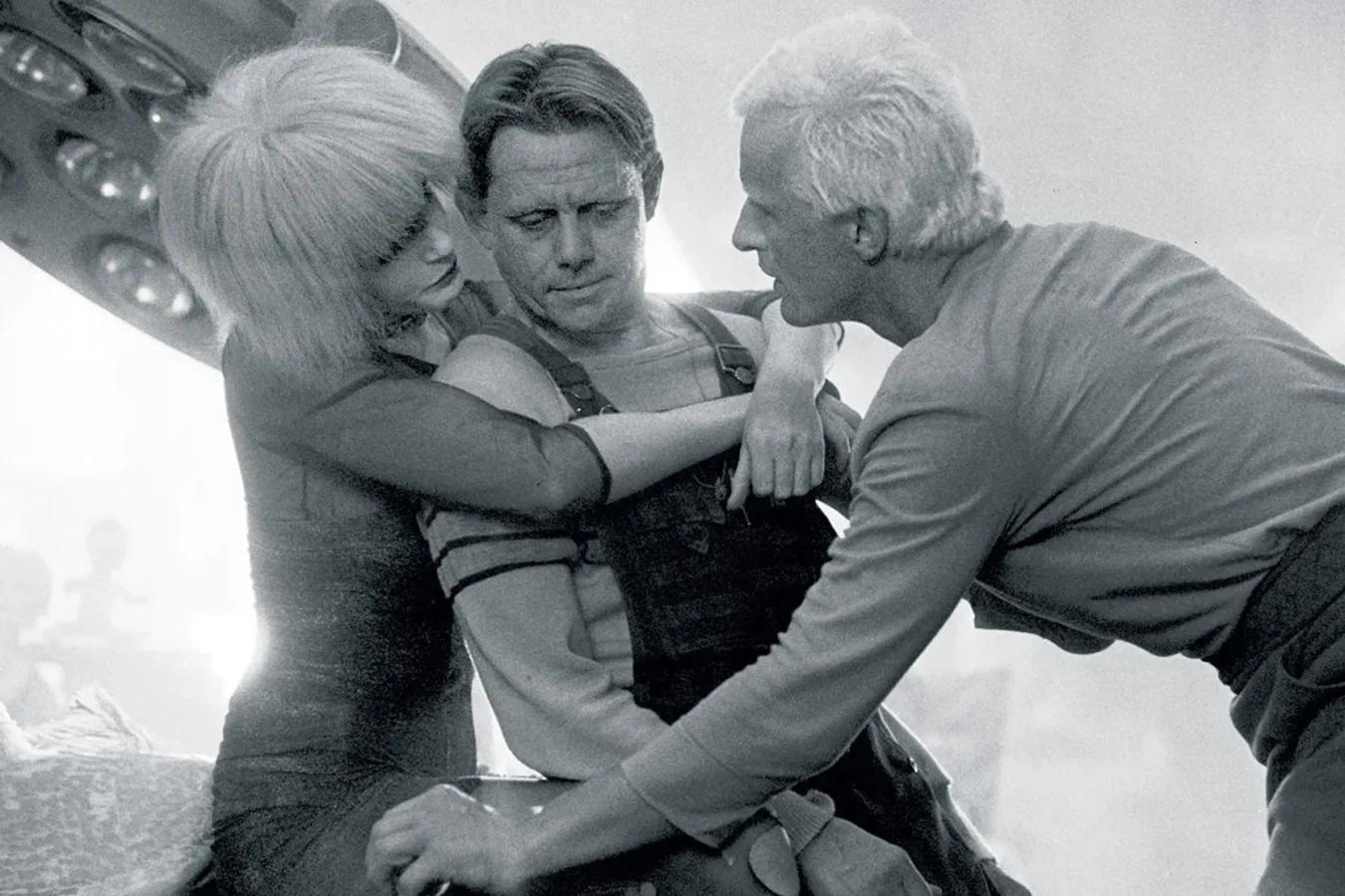 William Sanderson with Daryl Hannah and Rutger Hauer in a black-and-white behind-the-scenes photo from the Blade Runner apartment set