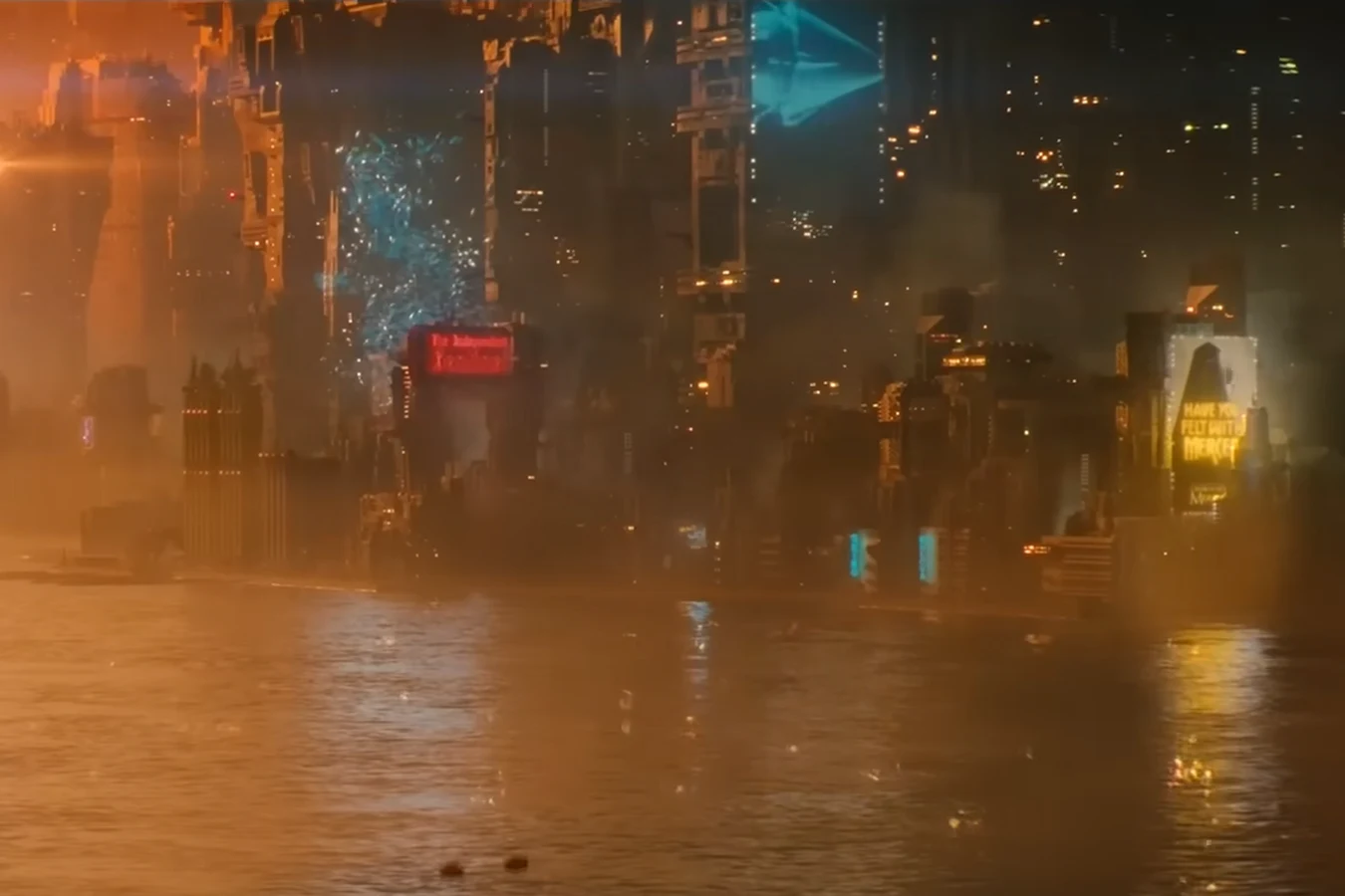 A glowing hillside climber hologram over coastal Los Angeles in Blade Runner 2099 trailer material