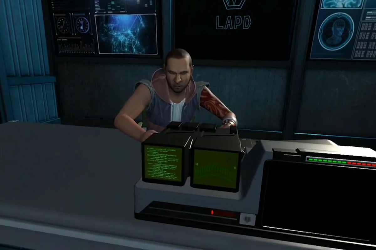 The suspect Lazarus seated at the Voight-Kampff machine in the interrogation room in Blade Runner: Revelations
