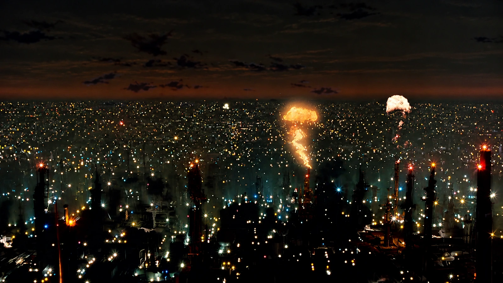 Night Los Angeles in Blade Runner, with refinery fires over the city grid