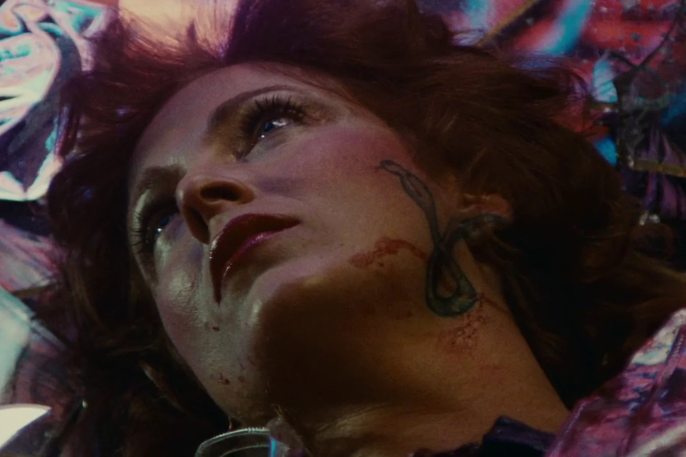 Zhora lying dead among the shattered glass of the shop window in Blade Runner