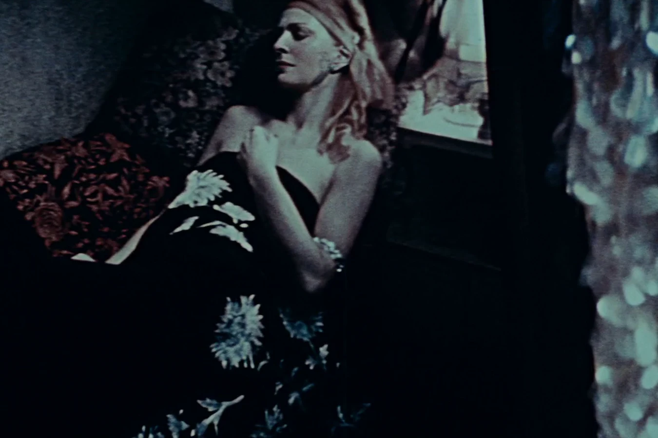 Zhora asleep on a daybed in the snapshot from Leon's hotel room in Blade Runner