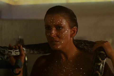 Joanna Cassidy as Zhora with her snake in the dressing room in Blade Runner