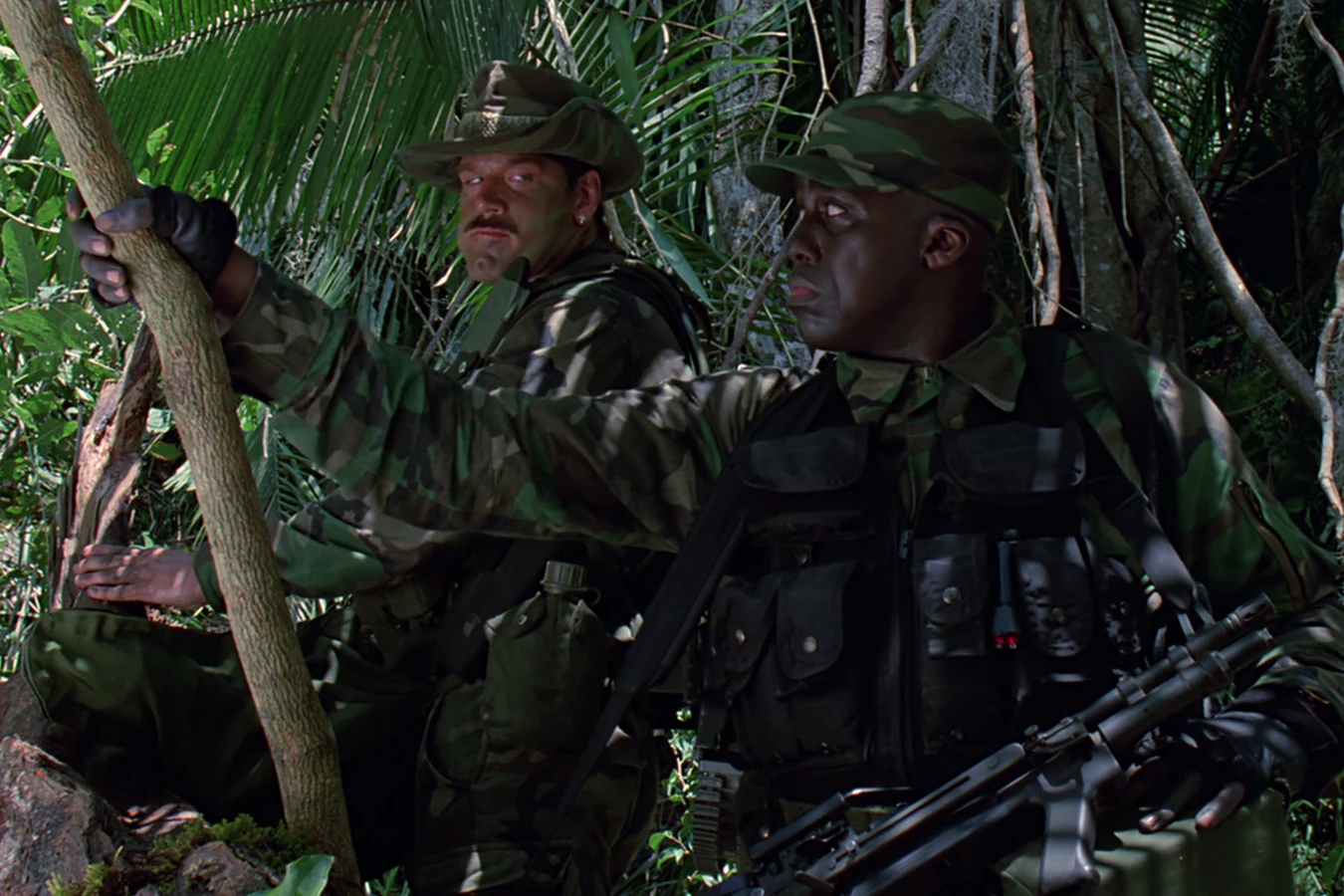 Dutch's team moving through the jungle on patrol in Predator