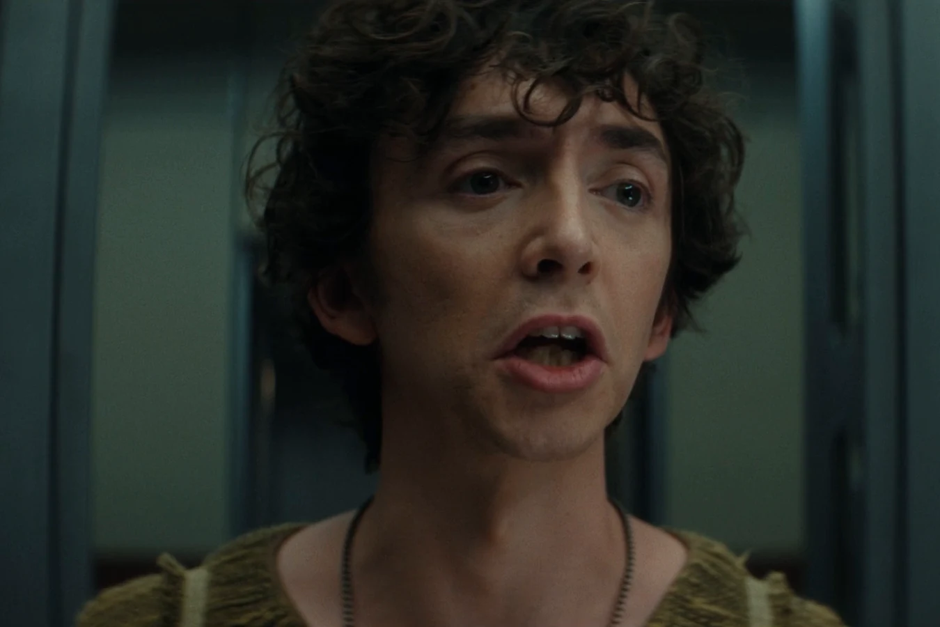 Boy Kavalier telling the caged Lost Boys the story of his childhood in Alien: Earth