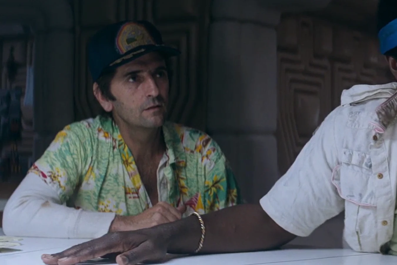 Brett faces Parker across the Nostromo mess table during the bonus argument in Alien