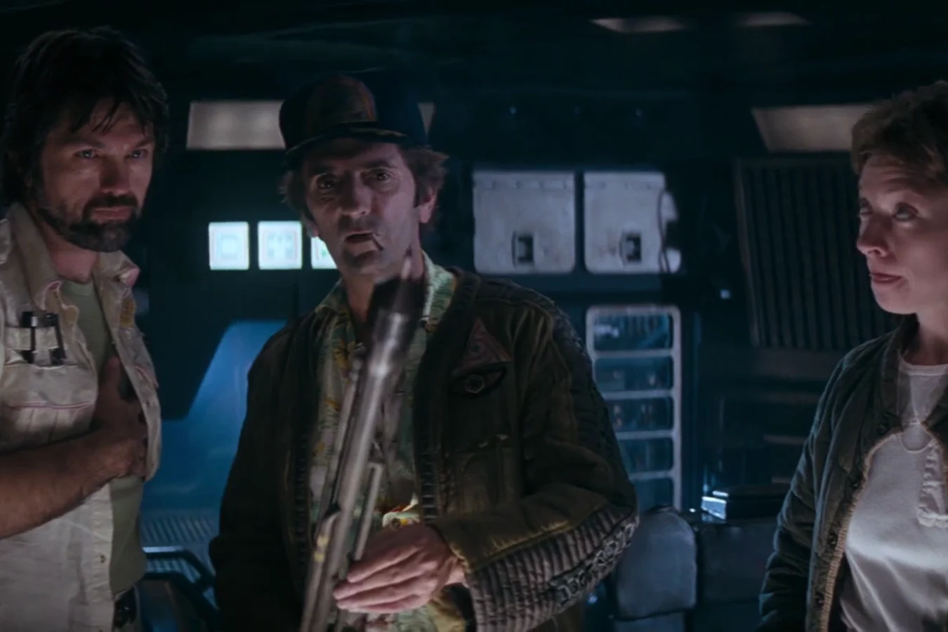 Brett holds a cattle prod beside Dallas and Lambert on the Nostromo in Alien