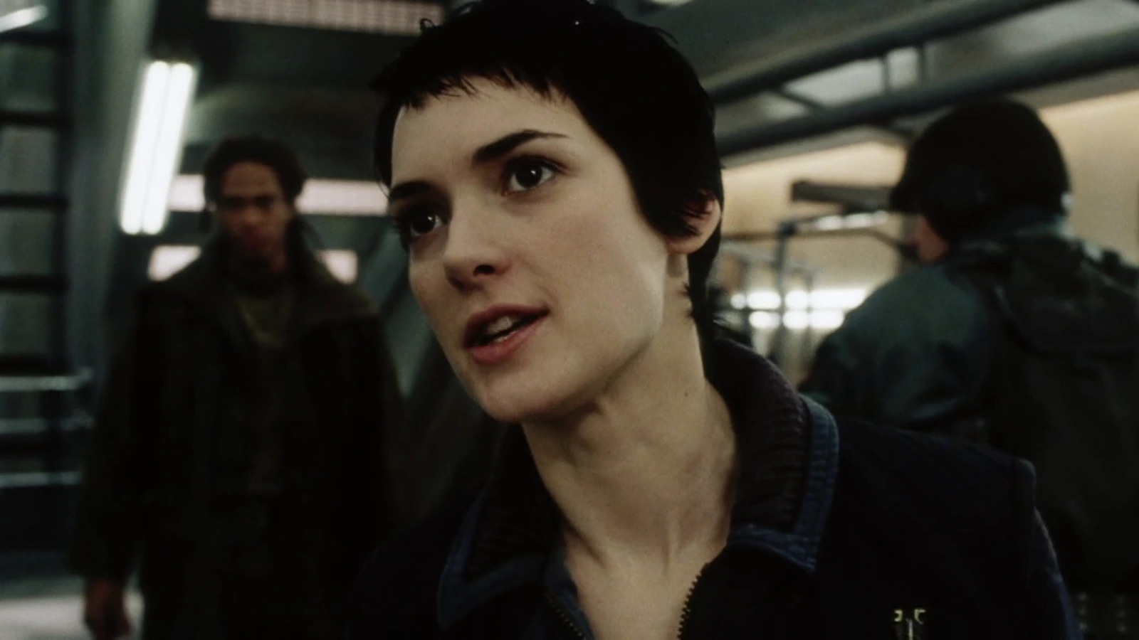 Annalee Call looking aside in a corridor in Alien: Resurrection