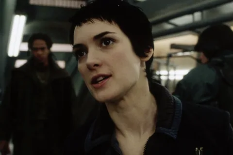 Annalee Call looking aside in a corridor in Alien: Resurrection