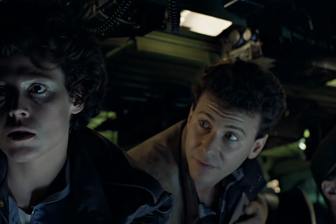 Carter Burke and Ellen Ripley watching the APC monitors at Hadley's Hope in Aliens