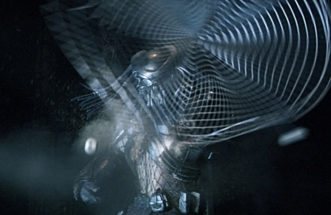 Celtic Predator shoots his netgun at a human mercenary