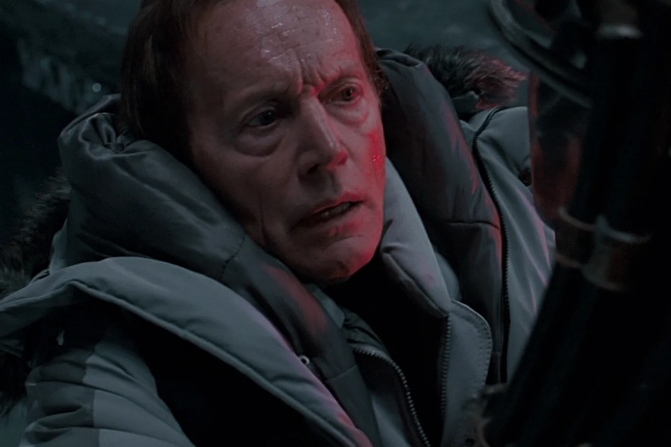 Charles Bishop Weyland faces Scar in the pyramid with blood on his cheek