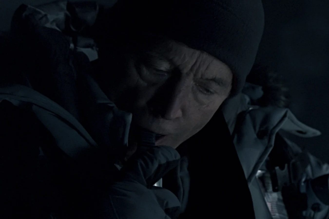Charles Bishop Weyland uses an inhaler in the dark of the Bouvetoya pyramid