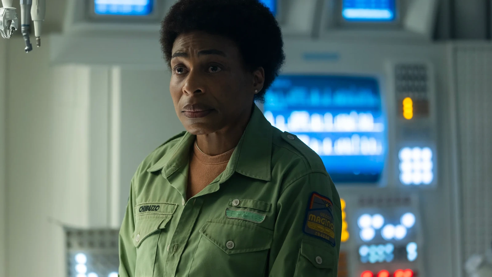 Chibuzo in her Maginot science uniform looking aside in Alien: Earth