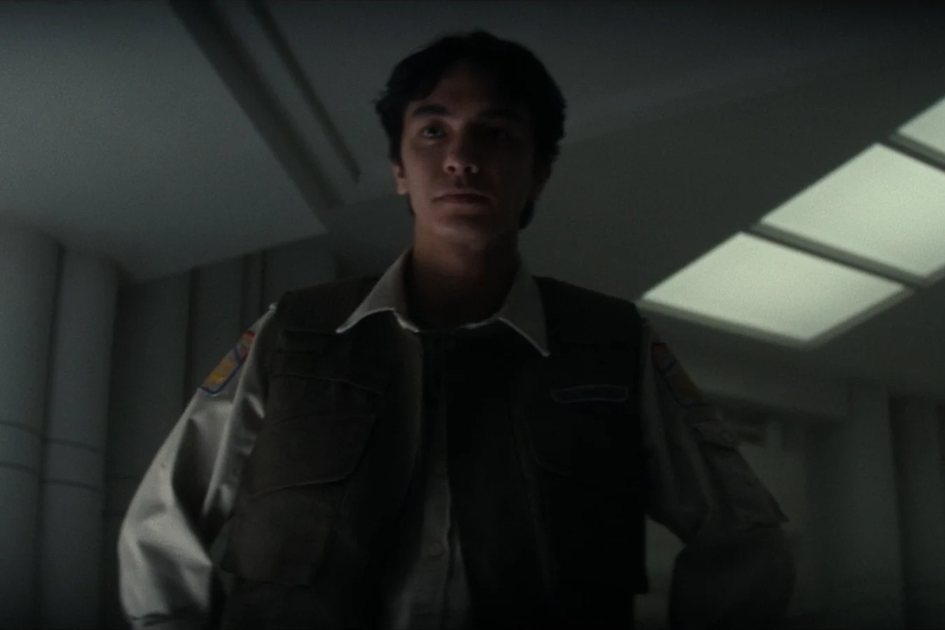 Clem Madey standing in a dim Maginot corridor in Alien: Earth