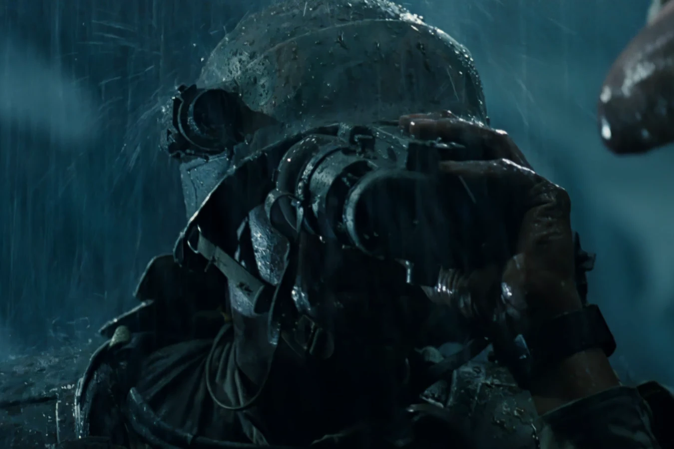 Colonial Marine using infrared binoculars in rain while wearing M10 helmet and M3 armor