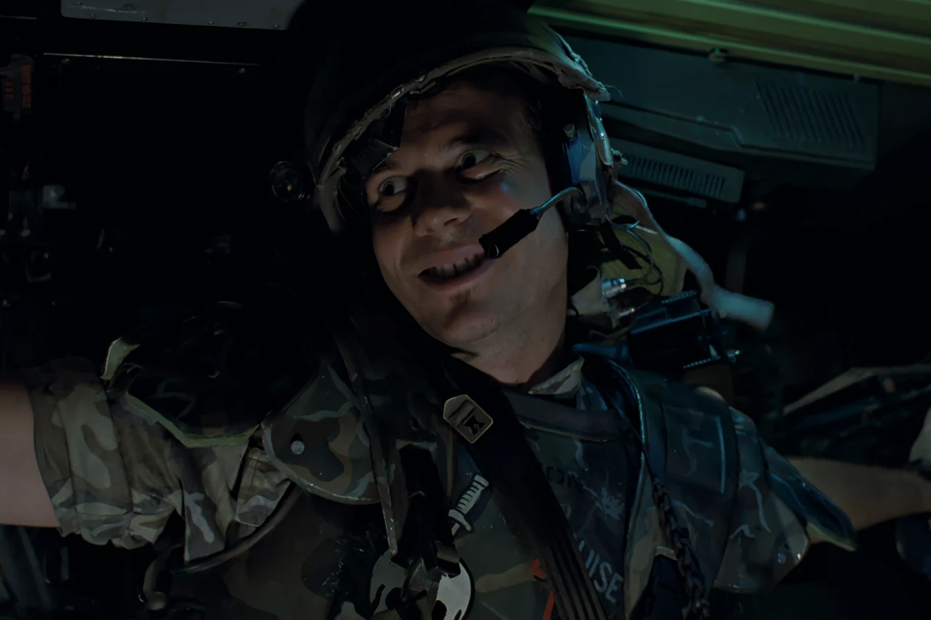Private Hudson wearing an M10 Pattern Ballistic Helmet with boom microphone and IR sight