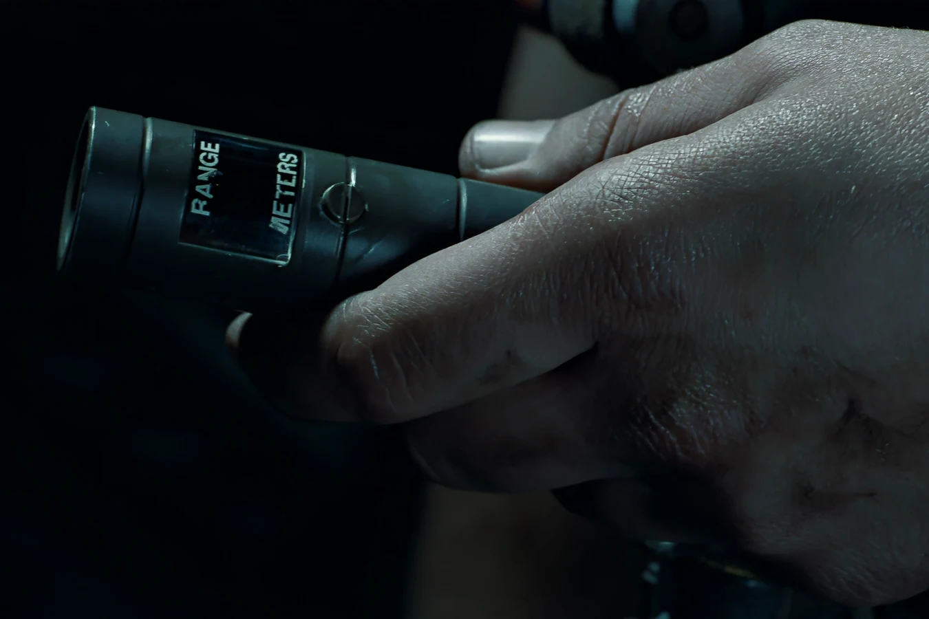 PDT/L locator tube handheld display showing RANGE METERS readout