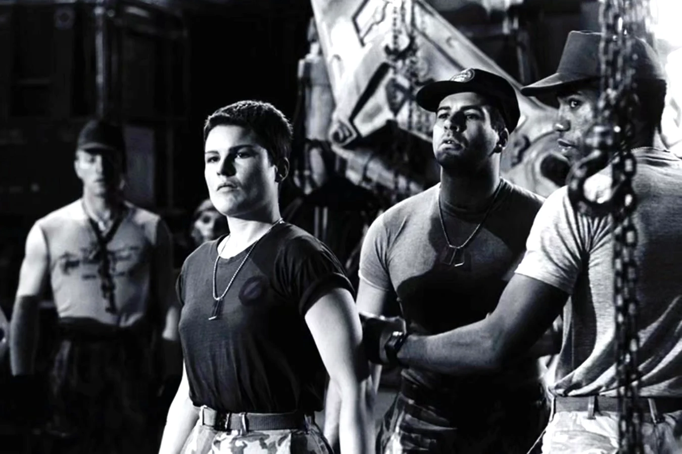 Cynthia Scott as Dietrich in fatigues and dog tags on the Aliens hangar set with Ricco Ross