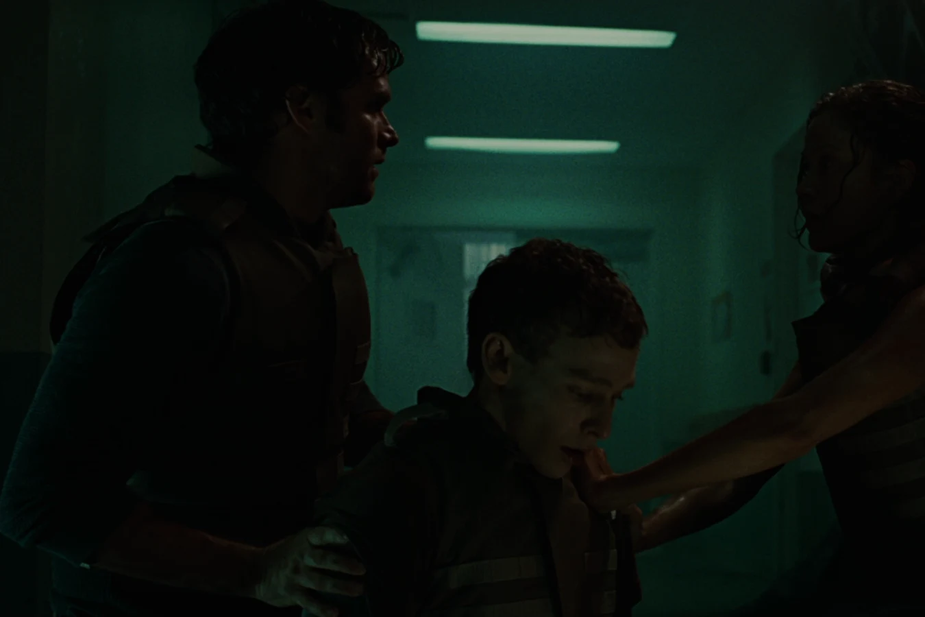 Dallas Howard with a wounded Ricky and Kelly O'Brien in the hospital corridors