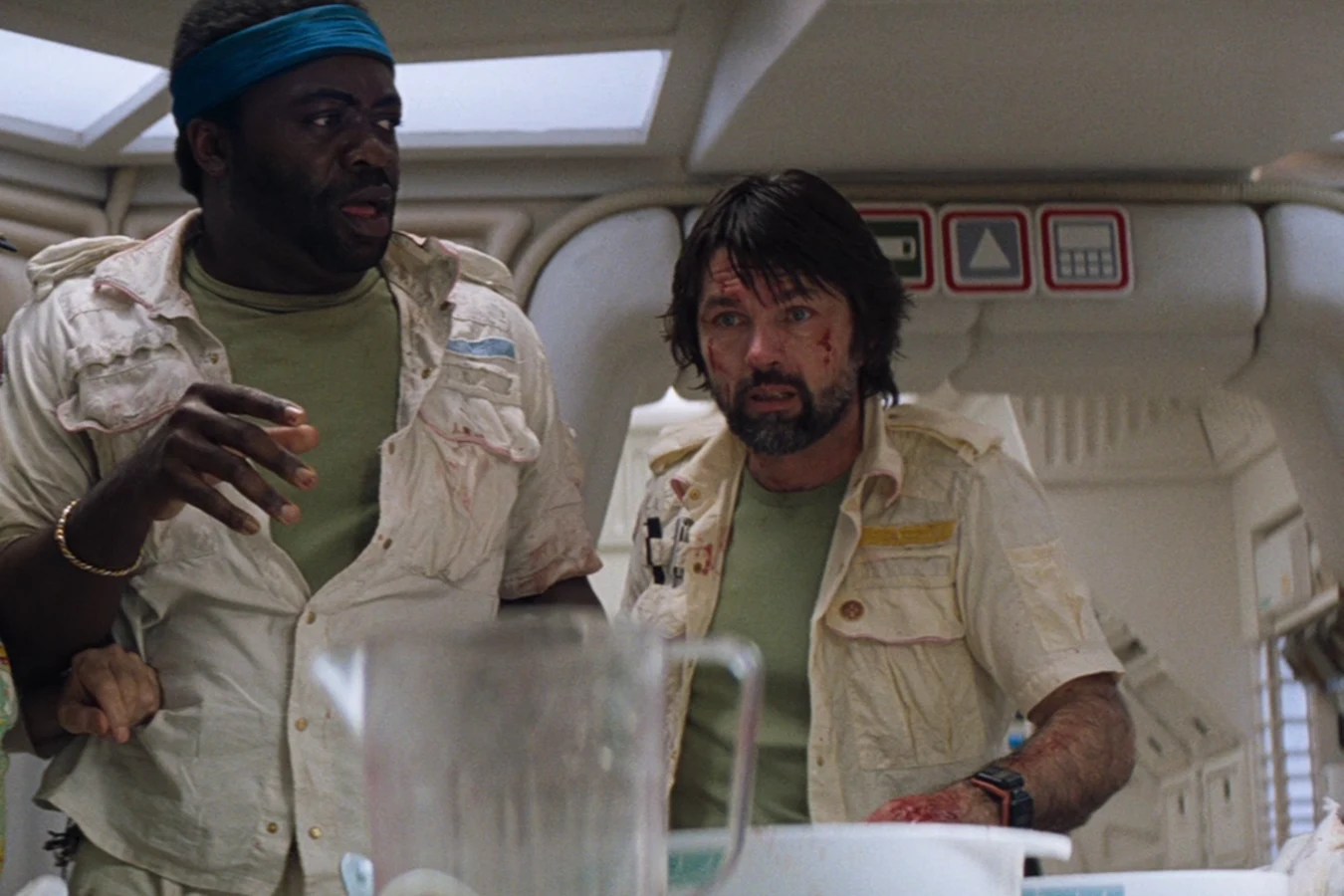 Dallas and Parker at the mess table after the chestburst in Alien