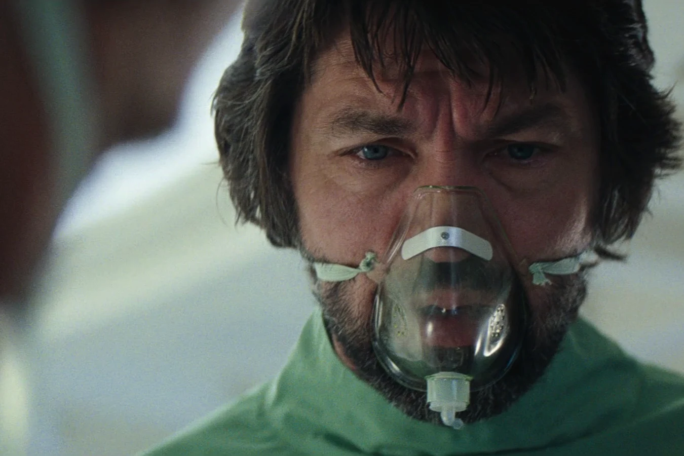Dallas in a surgical mask in the Nostromo infirmary in Alien