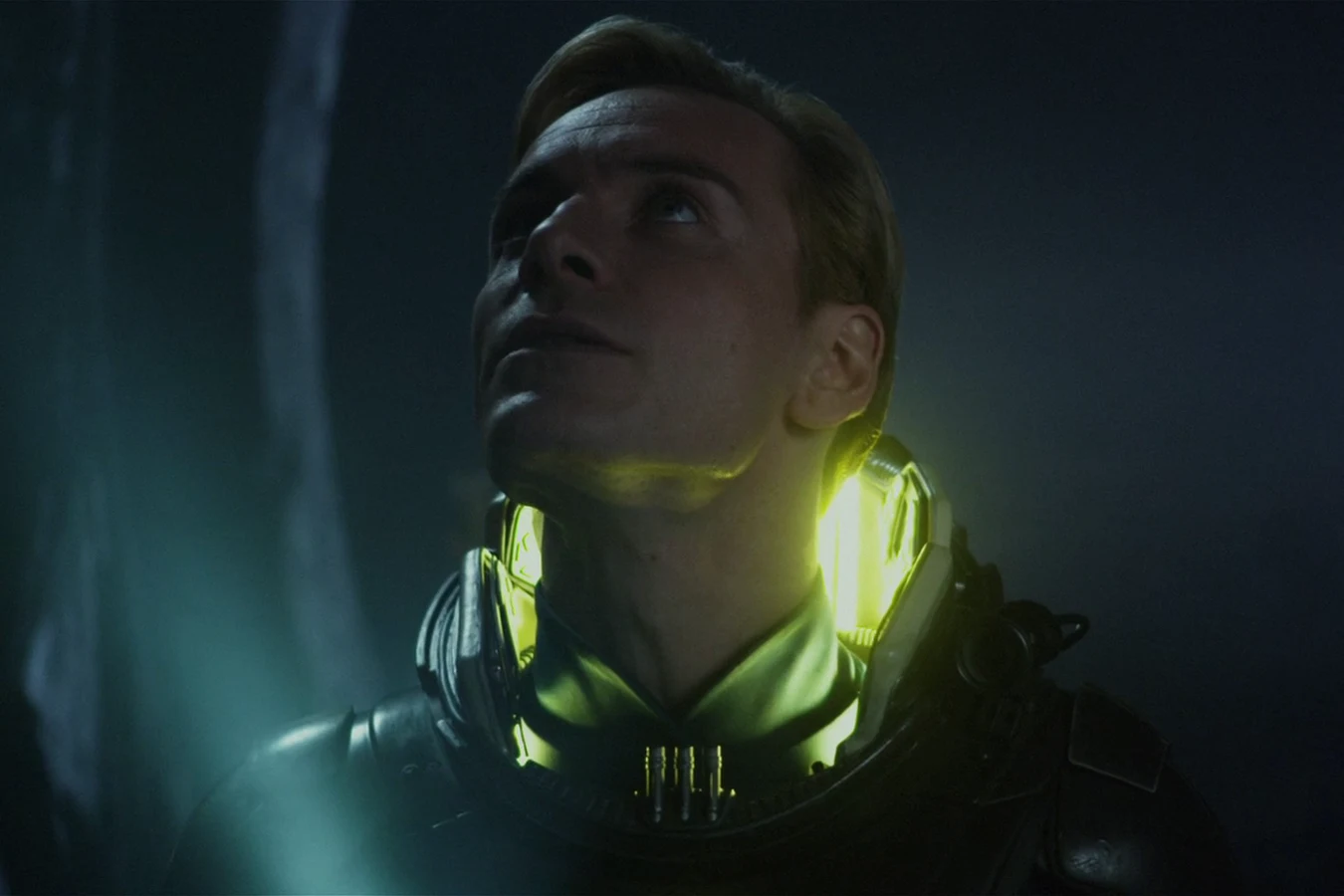 David in his Prometheus spacesuit looking up inside the Engineer structure on LV-223