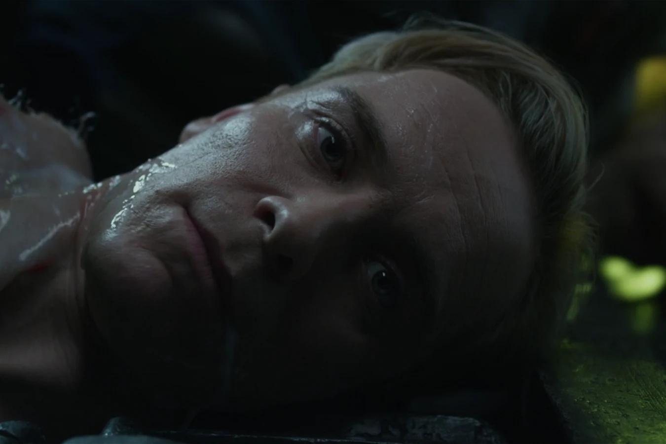 David's severed head lying on its side in the wreck of the Engineer ship