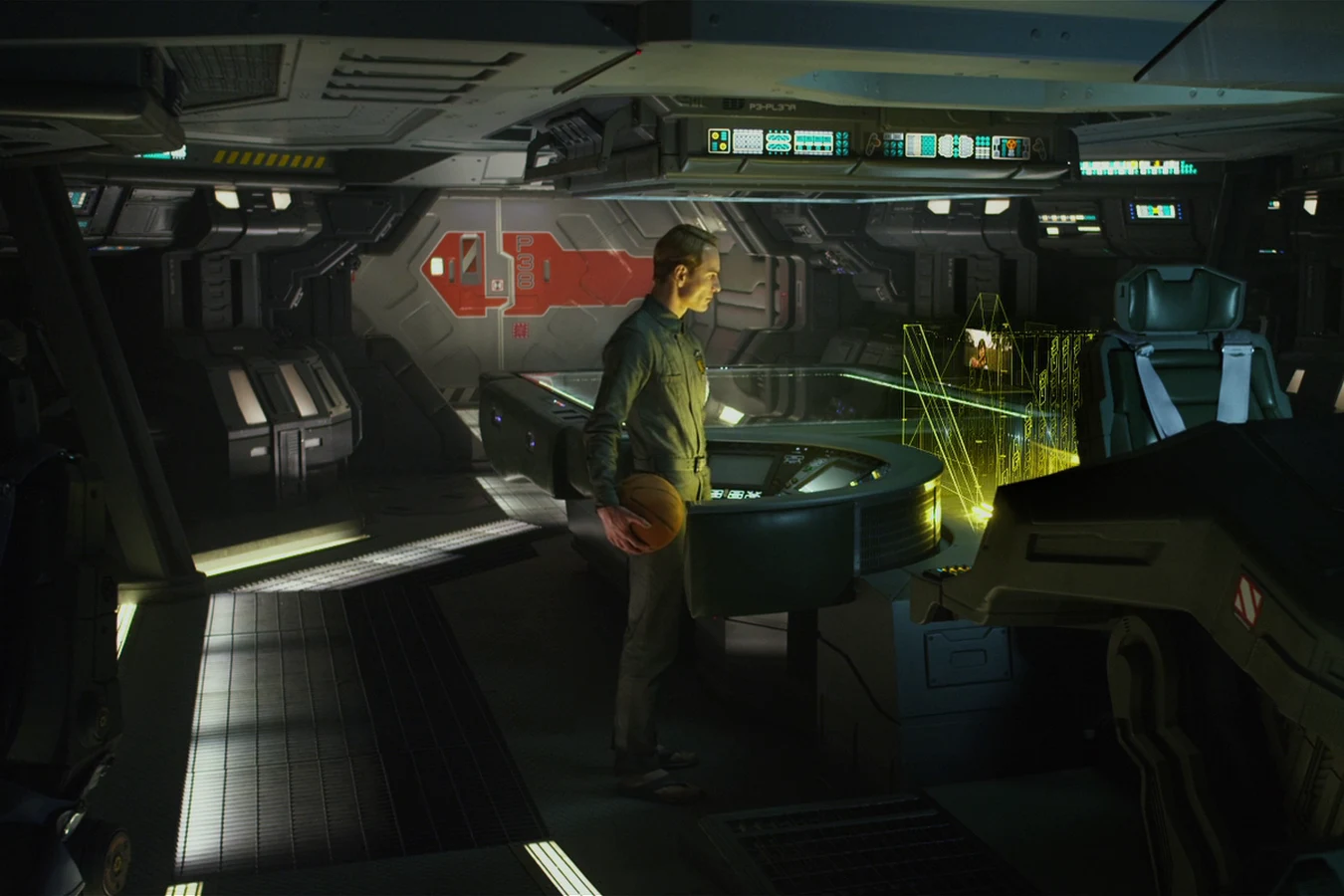 David riding a bicycle and shooting hoops in the empty gym of the Prometheus