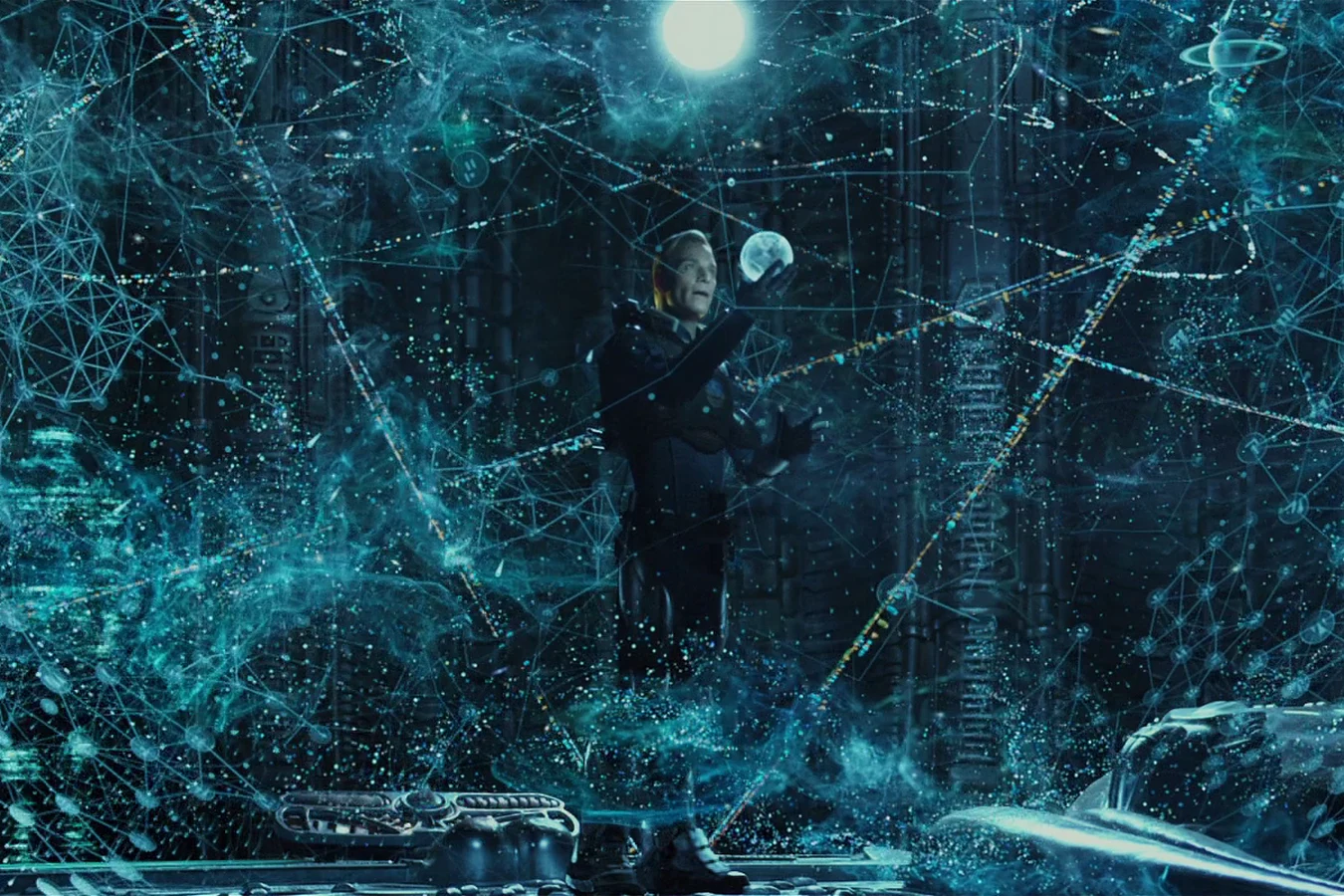 David reaching into the glowing orrery in the Engineer control room
