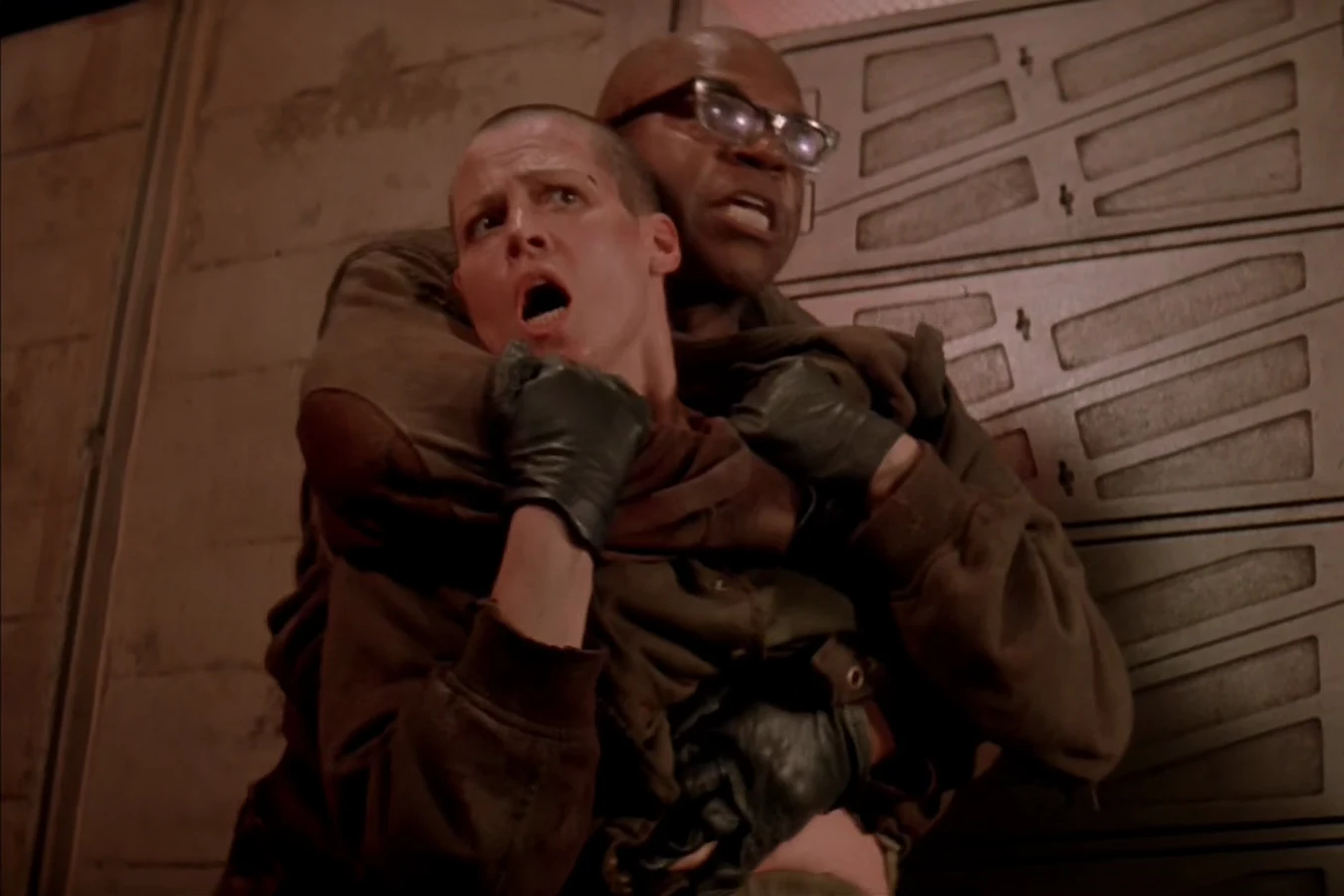 Dillon holding Ellen Ripley during the bait run in Alien 3