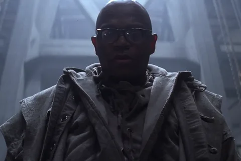 Dillon in glasses and a heavy coat in the Fiorina lead works in Alien 3