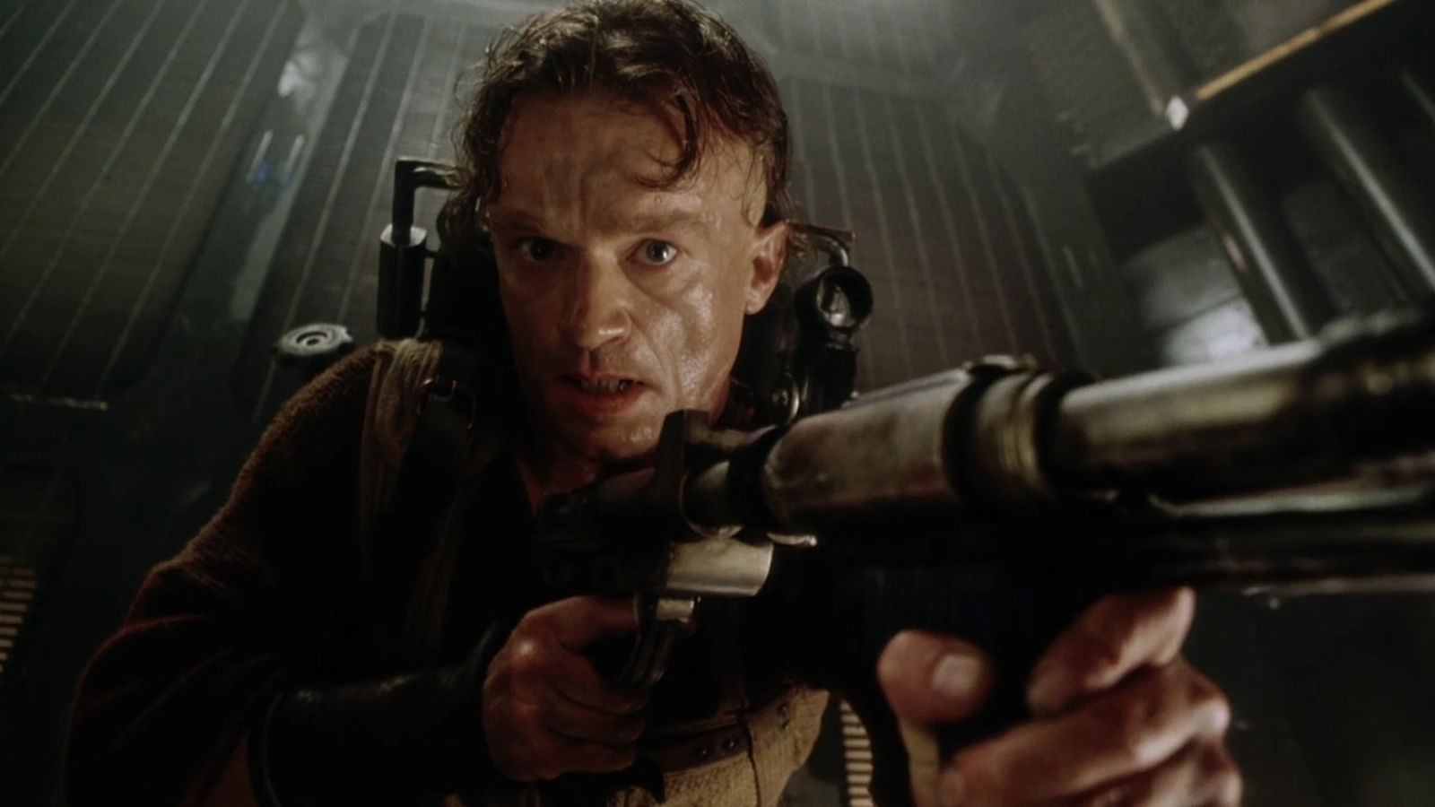 Vriess aiming his rifle aboard the Betty in Alien: Resurrection