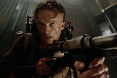 Vriess aiming his rifle aboard the Betty in Alien: Resurrection